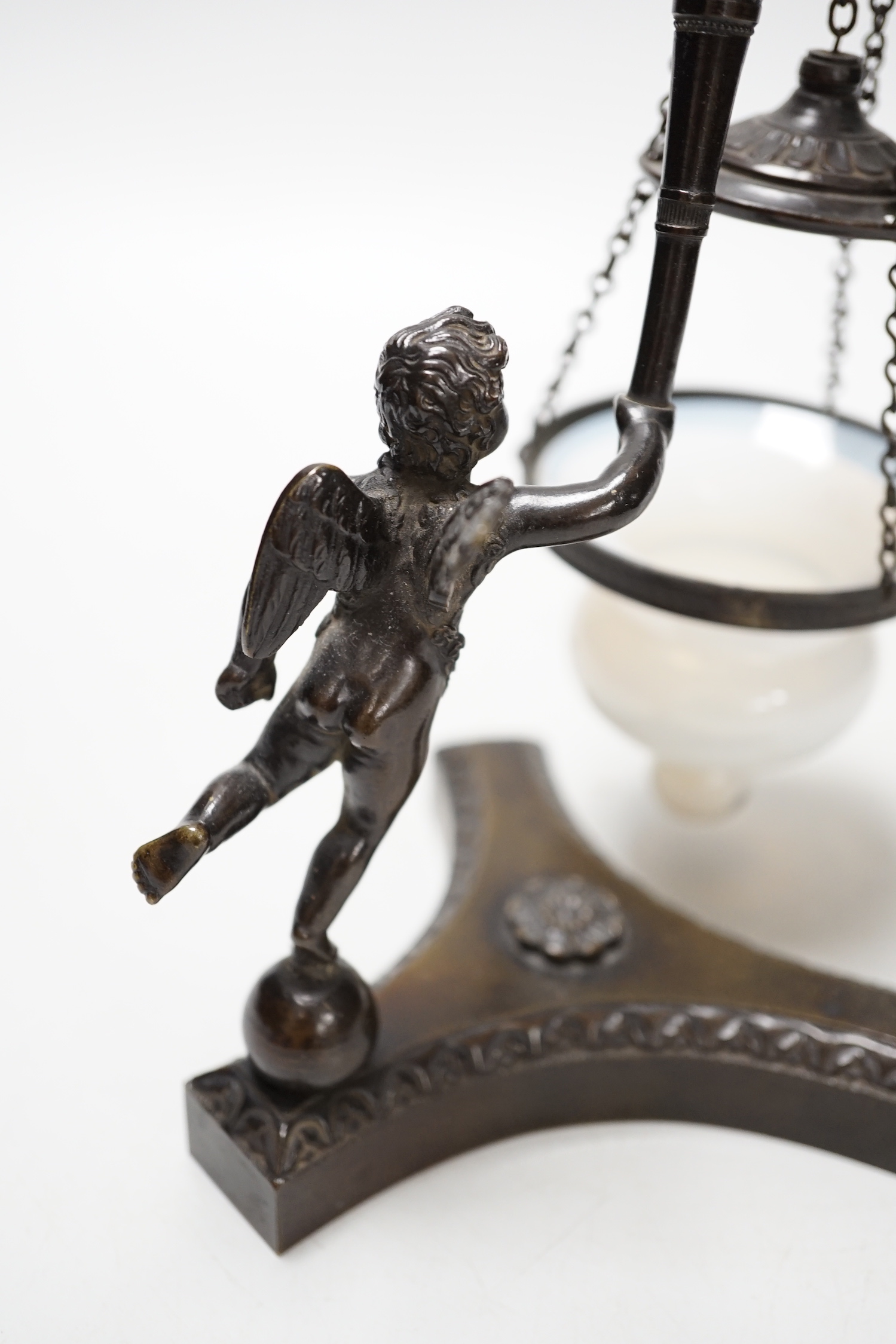 An early 19th century bronze ‘angel’ perfume warmer, 20cm high